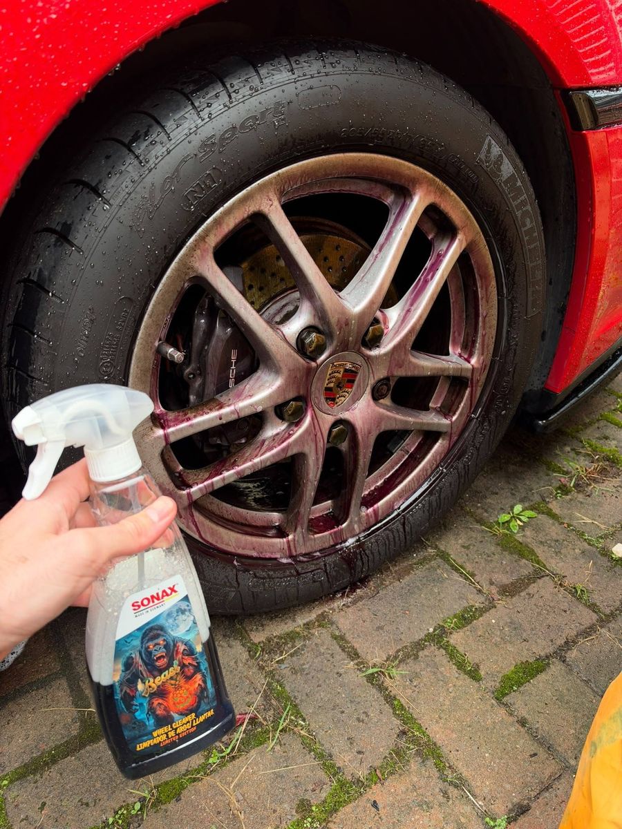 Porsche alloy wheel before cleaning, covered in brake dust